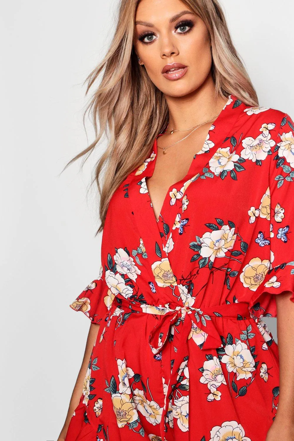 Playsuits | Plus Floral Printed Ruffle Hem Playsuit | boohoo